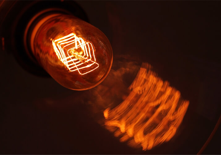 Light bulb lit energy produced by photovoltaic Baioni
